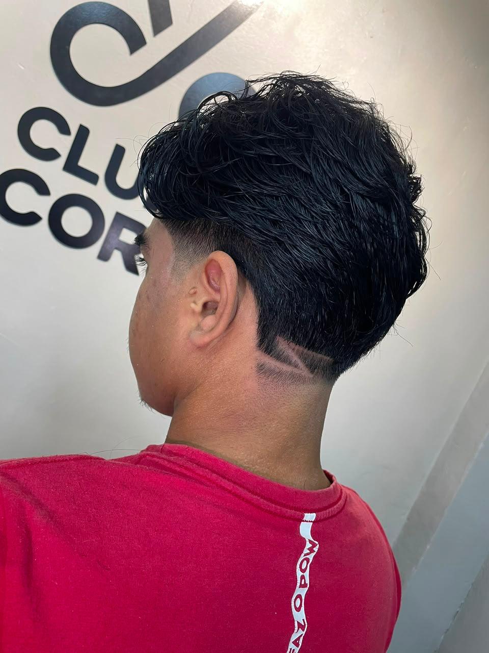 Atendimento em andamento na barbearia do Clube do Corte